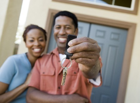 Couple with Keys to New Home